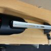Cradle for ebike bottle battery including base and lock 2 pin